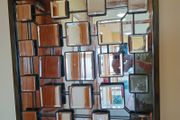 Faceted and Bevelled Bronze Framed Arts and Crafts Style Mirror.