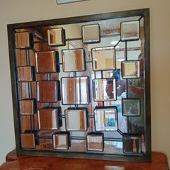Faceted and Bevelled Bronze Framed Arts and Crafts Style Mirror.