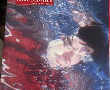 Mike Oldfield. Earth moving picture sleeve vinyl record single in vg+ condition
