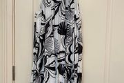 Black and white patterned pleated halter neck dress