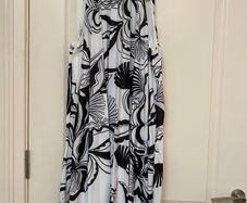 Black and white patterned pleated halter neck dress