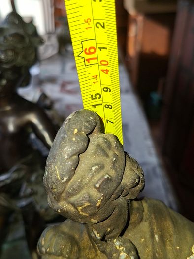 Antique Sculpture a gilt-bronze cast-metal Spanish Conquistador. On his torso is a Cross Pattee, a historical motif commonly associated with Christian military orders and medieval heraldry