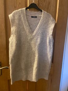 Warm sleeveless jumper size large