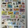 Collection. Green Lighthouse Stamp Stock book full of used stamps.  Over 600 stamps and a number of block. Good thematic of travel inc cars & animals Image 7
