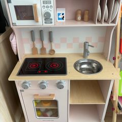 Little girls pink wooden kitchen
