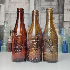 257 - Set of 3 Vintage Brown Glass Scanlan Cades Jennings Collectible Decorative Mineral Water Beer Bottles