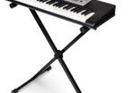 New Keyboard in box + stand