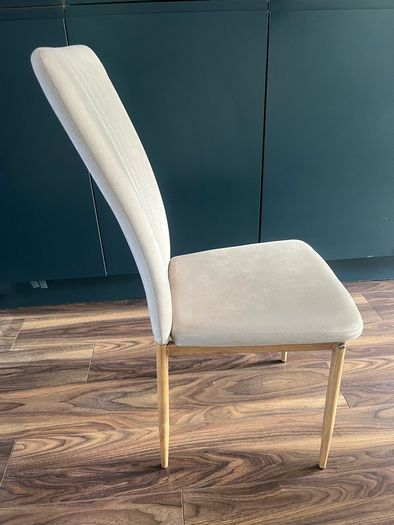 4 beige dining chairs and 2 counter stools