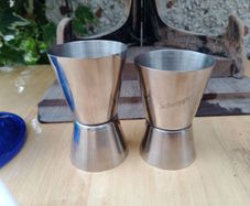 Schweppes, spirit measure, jigger, cocktail measure