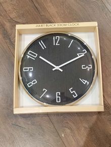 Brandnew wall clock 33 cm
