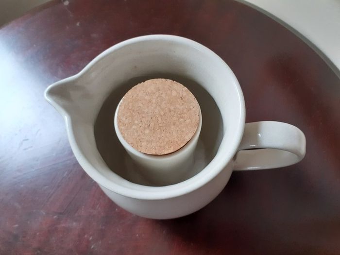 Pottery Pitcher with Ice Section