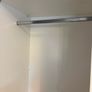 Large white wardrobe with mirrored sliding doors. Image 4