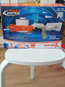 Toilet paper launcher toy