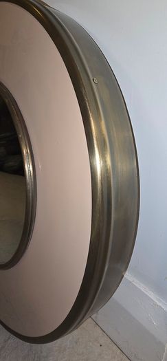 Deep round mirror detail and dusty pink