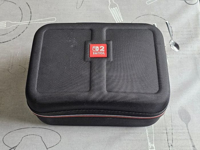 Nintendo Switch 2 (w/case, pro controller, 256gb sd card)
