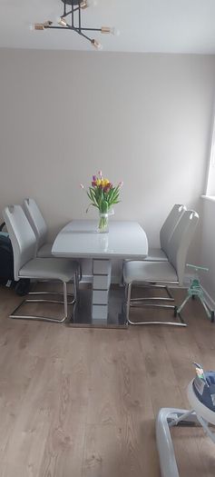 gray extending dining table and 4 chairs