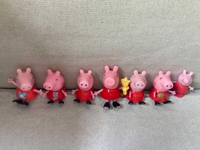 Peppa pig characters and suitcase