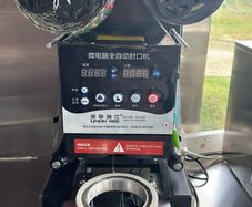 Cup sealing machine