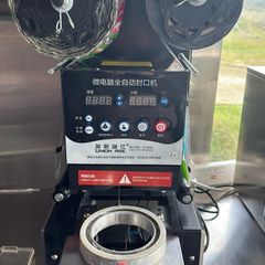 Cup sealing machine