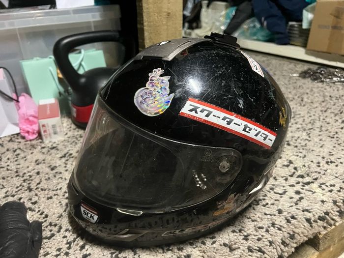 motorbike suit gloves and helmet