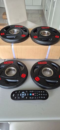 brand new 4x2.5kilo olympic weight plates