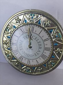 collectable clock tin