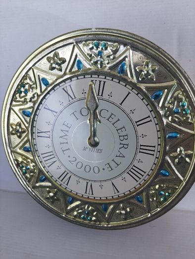 collectable clock tin
