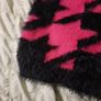 pink and black fluffy fila hoody Image 4