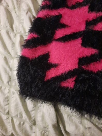 pink and black fluffy fila hoody