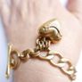 Juicy Couture Logo Heart J Charms Gold Tone Chain Link Toggle Clasp Bracelet 8" Image 7