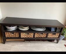 Sideboard with rattan baskets