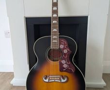 J200 Epiphone inspired by gibson guitar .