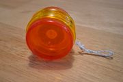 Red-yellow plastic yoyo