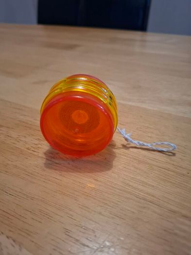 Red-yellow plastic yoyo
