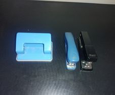 1 Hole Punch and 2 staplers