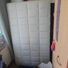 white leather double bed