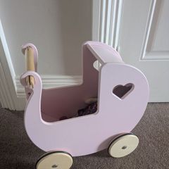 Pink moover dolls wooden pram