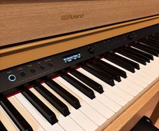 Immaculate Roland HP702 upright digital piano