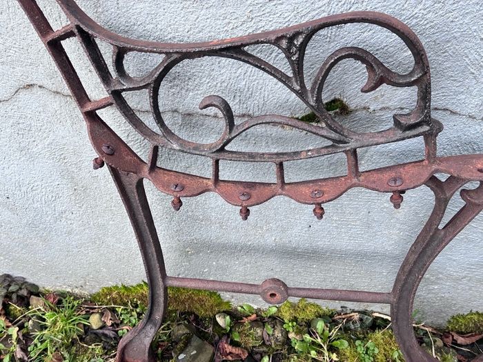 Pair cast iron children's bench ends
