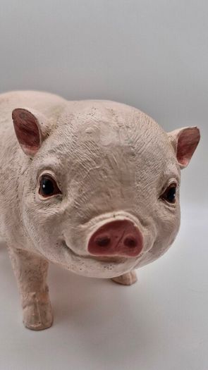 Pair of garden piglet statuet
