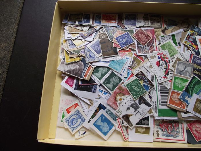 A box with collection of stamps from Great Britain