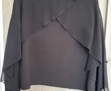 Top with cape-style overlay