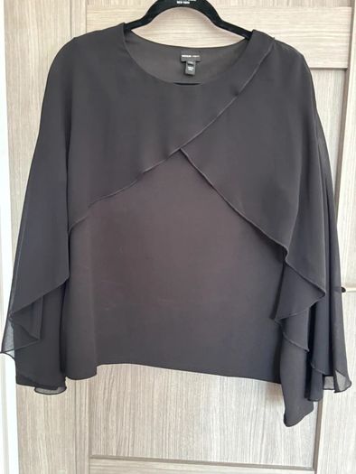 Top with cape-style overlay