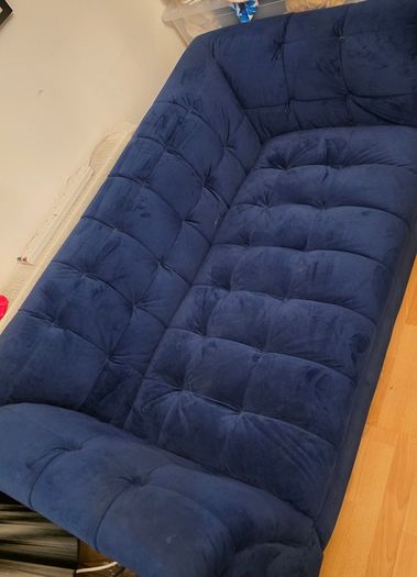 Blue velvet sofa