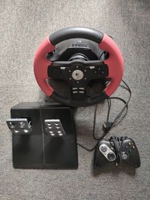 Logitech steering wheel with pedals and controller