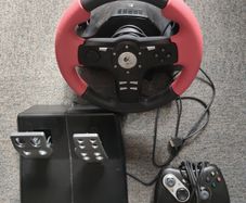 Logitech steering wheel with pedals and controller