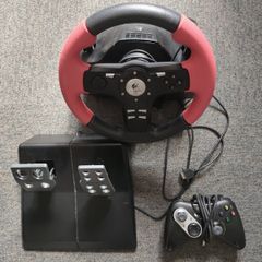 Logitech steering wheel with pedals and controller