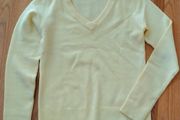 Women's yellow v-neck jumper