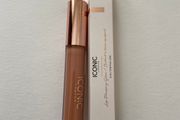 Iconic London lip plumping gloss in nearly nude