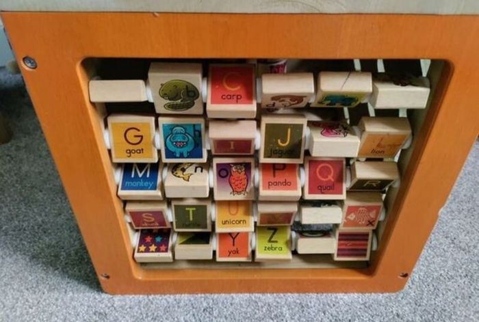 B. toys Zany Zoo Wooden Activity Cube Assortment